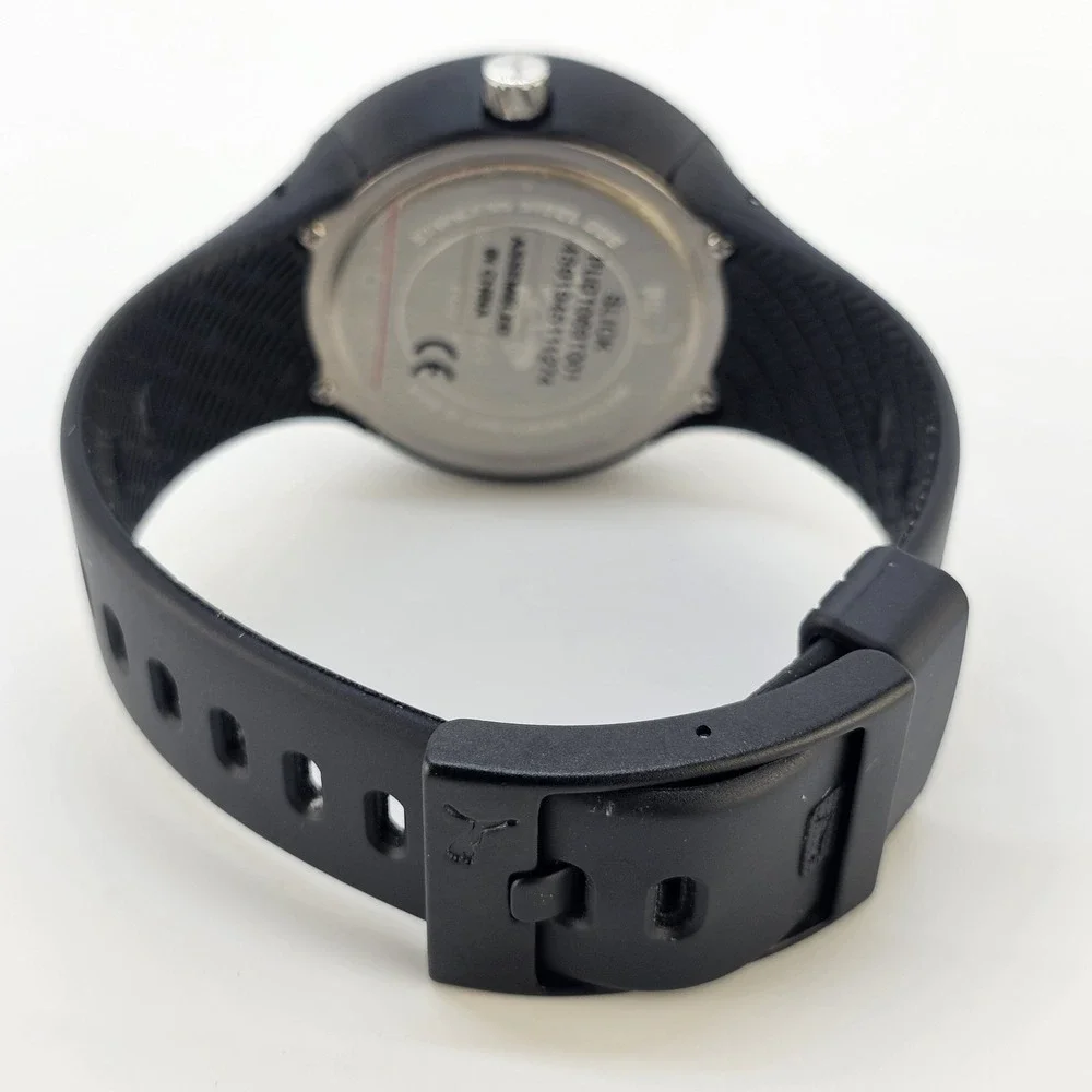 Puma Slick Men's Watch 45MM Black Dial Date Black Plastic Bands New Battery